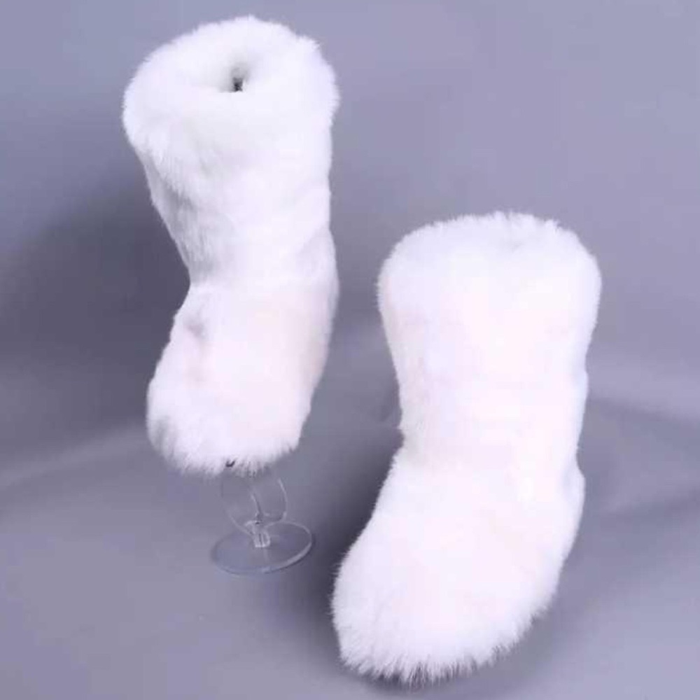 White fur boots